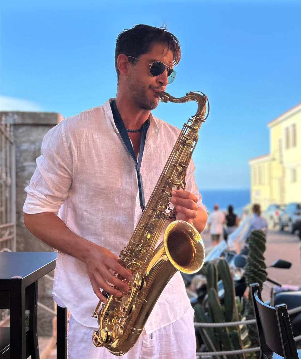 Franco Giardino playing saxophone, Santa Teresa di Gallura, Sardegna, Italy